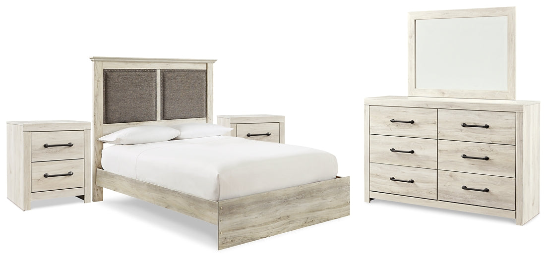 Cambeck King Upholstered Panel Bed with Mirrored Dresser and 2 Nightstands