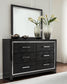 Kaydell King Upholstered Panel Bed with Mirrored Dresser and Chest